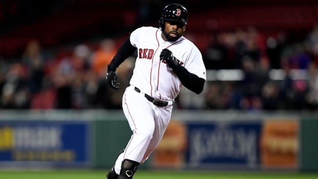Jackie Bradley Jr. rounds the bases in a game at Fenway Park against the San Francisco Giants.